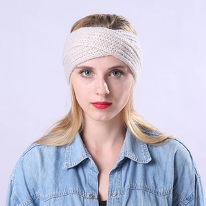 Handmade striped knit headband for women in cream beige with stylish twist knot design