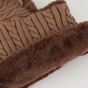 Winter cable knit hat with thick plush faux fur lining for maximum warmth and comfort
