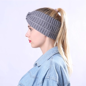 Winter grey chunky knit headband for women providing warmth and stylish hair accessory