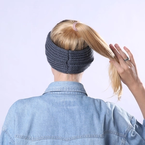 Dark grey knitted winter headband with striped texture for ear protection and warmth
