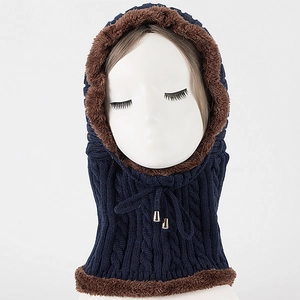 Close-up of cable knit winter balaclava with thick brown plush lining and drawstring