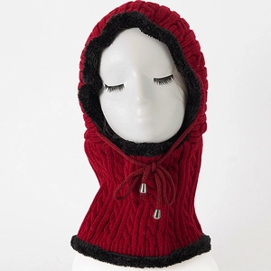 Detailed close-up of dark red cable knit balaclava with warm thick black faux fur lining