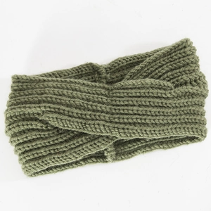 Detail of olive green knit headband with cross-knot twist and ribbed texture