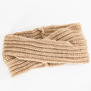 Detail of camel knitted headband showing ribbed texture and twisted knot design