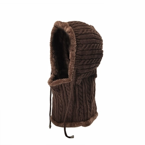 Close-up of knit texture and thick faux fur lining on dark brown winter balaclava hood