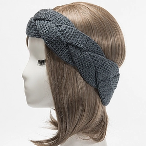 Winter chunky cable knit headband in dark grey on mannequin showing warm ear coverage
