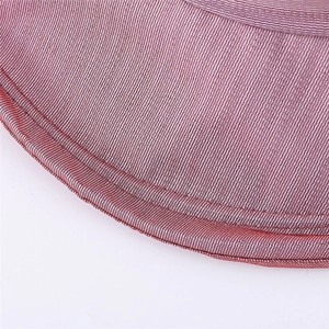 Close-up of mesh fabric with purple gradient and reinforced stitching on sun hat