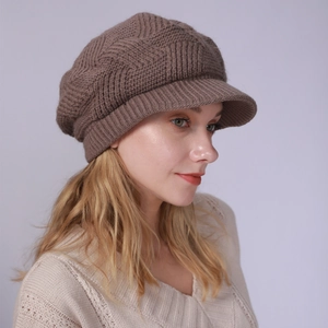 Detailed side view of brown twill knit wool beanie with brim for women autumn style