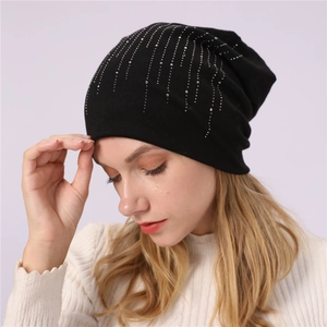 Women's black cotton slouchy beanie with elegant vertical silver rhinestone stripes