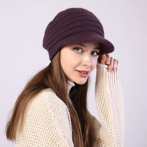 Detail view of deep purple striped knit hat with short brim and soft warm lining