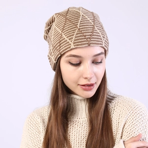 Detail showing khaki and beige diamond lattice knit pattern on the warm winter beanie hat