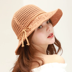 Breathable crochet sun hat for women with diamond pattern and a decorative bow