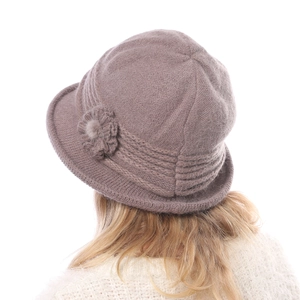 Detail of flower knit cloche hat with thick faux rabbit fur texture for winter