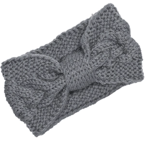 Detail of dark grey thick cable knit headband showing the texture and twist knot design