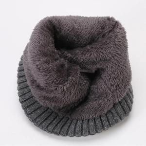 Detail of dark grey knit neck warmer with thick faux fleece lining for winter warmth