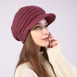 Close-up of burgundy striped knit visor beanie with thick fleece lining for winter
