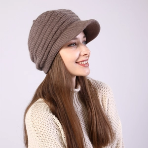 Detail of dark brown ribbed knit peak cap showing soft texture and warm fleece lining