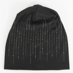 Close-up detail of black cotton slouchy beanie with silver rhinestone raindrop patterns