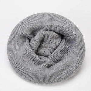 Detail showing grey ribbed knit texture and soft yarn fabric of the flower basin hat