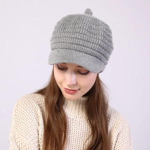 Close-up of grey striped knit visor beanie showing fine texture and ribbed pattern