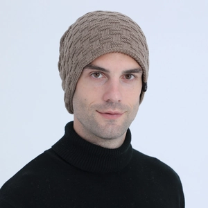 Close-up of light brown knitted beanie featuring a textured checkerboard pattern for men