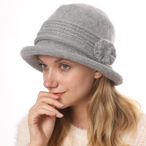 Grey faux rabbit fur floral knit bucket hat for women showing cozy winter texture