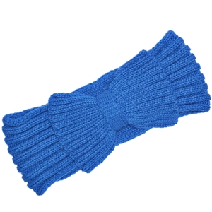 Close-up of blue knitted headband with large bowknot detail for winter warmth