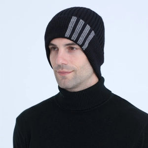 Close-up of black fleece-lined knit earflap hat with gray vertical stripe accents