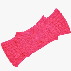 Detail of rose red knitted headband with bow design and soft acrylic wool texture