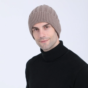 Detail of coffee brown ribbed knit hat with soft fleece lining for autumn and winter