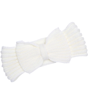 Close-up of white knitted headband showing thick texture and large bow detail