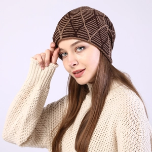 Detail of winter beanie featuring a brown diamond knit pattern and thick thermal texture
