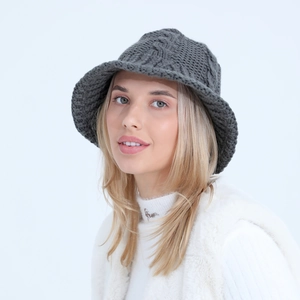 Detailed knit texture of dark grey twist pattern bucket hat for winter fashion