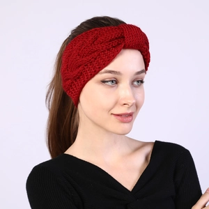 Detailed view of the dark red cable knit pattern on a winter twist headband accessory