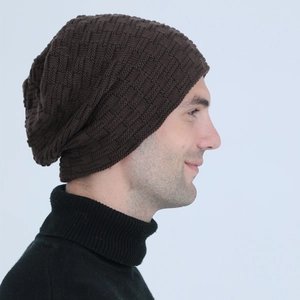 Close-up of dark brown men's beanie showing thick textured knit pattern and warm lining