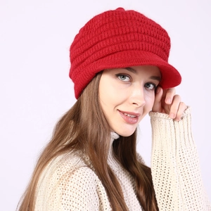 Close-up of red striped knit visor beanie with thick fleece lining for winter warmth