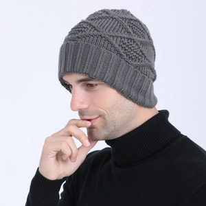 Macro detail of dark grey knit beanie with diamond pattern and ribbed cuff for men
