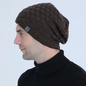 Close-up of a brown knit beanie for men featuring a textured pattern and bear patch