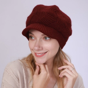 Women's burgundy twill knit newsboy hat with fleece lining for warm winter style