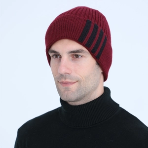 Close-up of burgundy ribbed knit beanie for men with modern black stripe side detailing