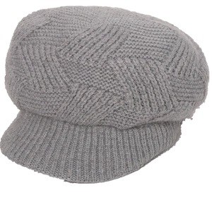 Grey knit beret hat with fuzzy wool texture and geometric weave pattern for winter fashion