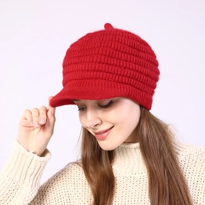 Women's red striped knit peaked cap with fleece lining for winter warmth and fashion
