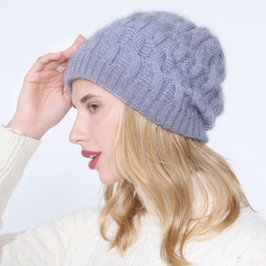 Macro detail of lilac knit beanie featuring chunky cable pattern and subtle metallic glitter