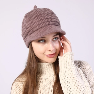 Detail of chunky knit striped pattern on warm winter newsboy cap for women