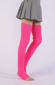 Detail of rose pink ribbed knit over-knee leg warmers with stirrup design for yoga and ballet