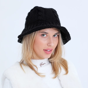 Detailed view of black knitted bucket hat showing premium thick wool weave texture