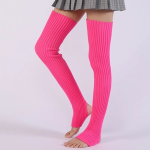 Detailed knit texture of bright pink over-knee leg warmers for ballet and yoga wear