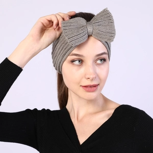 Women's grey knitted bow headband for autumn and winter warmth and hair styling