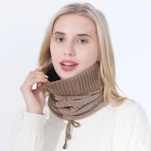 Close-up of brown ribbed knit neck warmer with adjustable silver toggle drawstring