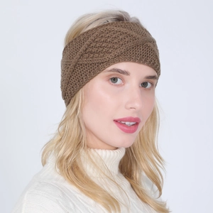 Detailed close-up of brown knit headband with classic twist knot texture for women